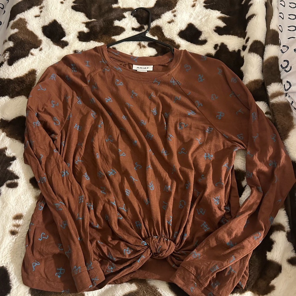 Brown Top with Blue Accents